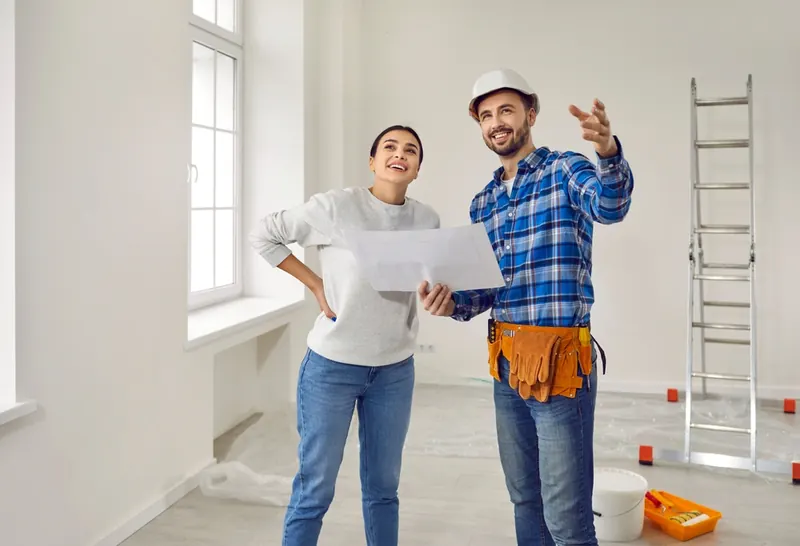 A homeowner working with their contractor.